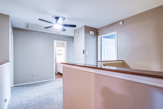 10835 Spruce Dr S, La Porte, TX 77571 - hallway featuring attic access, carpet flooring, and baseboards