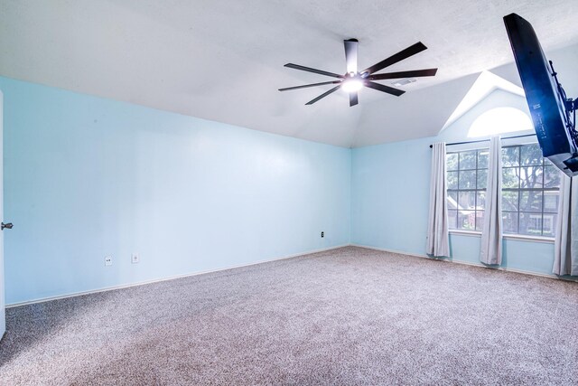 10835 Spruce Dr S, La Porte, TX 77571 - carpeted spare room featuring a ceiling fan, vaulted ceiling, and baseboards