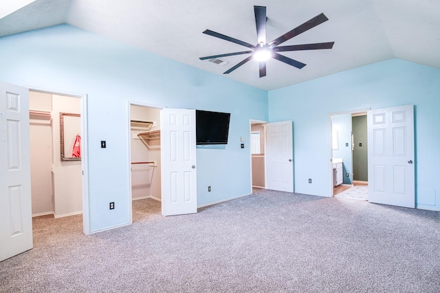 10835 Spruce Dr S, La Porte, TX 77571 - unfurnished bedroom featuring vaulted ceiling, a spacious closet, carpet floors, a closet, and ensuite bathroom