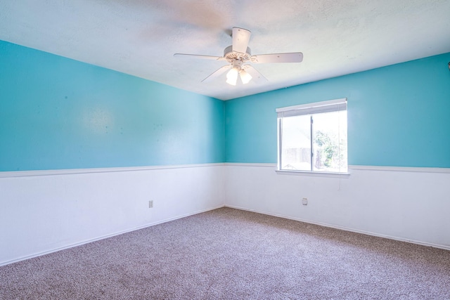 10835 Spruce Dr S, La Porte, TX 77571 - spare room featuring carpet floors, ceiling fan, and baseboards