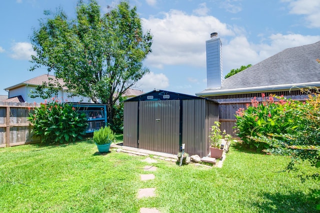 10835 Spruce Dr S, La Porte, TX 77571 - view of yard featuring a storage unit and an outbuilding
