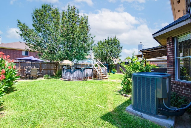 10835 Spruce Dr S, La Porte, TX 77571 - view of yard with central AC