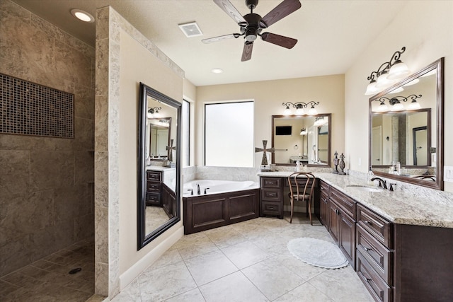 full bath featuring ceiling fan, a garden tub, a tile shower, vanity, and tile patterned flooring