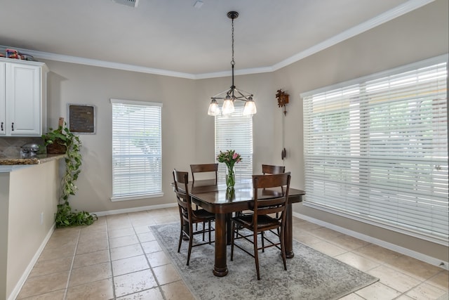 12127 Via San Rocco Ct, Cypress, TX 77429 - dining area with crown molding, a chandelier, baseboards, and light tile patterned floors