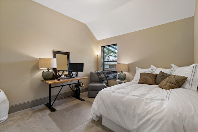 9010 Kapri Ln, Houston, TX 77025 - bedroom with carpet floors, vaulted ceiling, and baseboards
