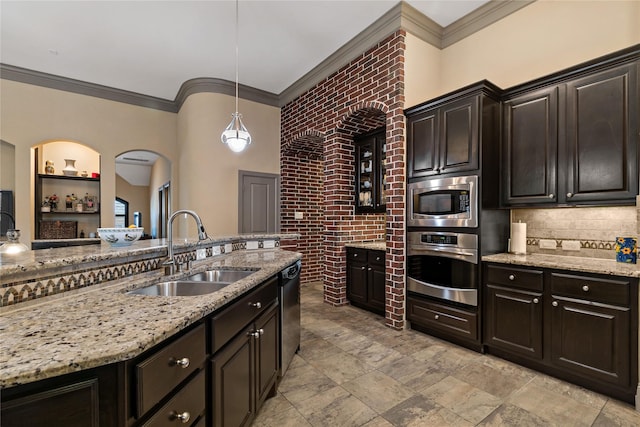 9010 Kapri Ln, Houston, TX 77025 - kitchen featuring stainless steel appliances, a sink, crown molding, light stone countertops, and hanging light fixtures