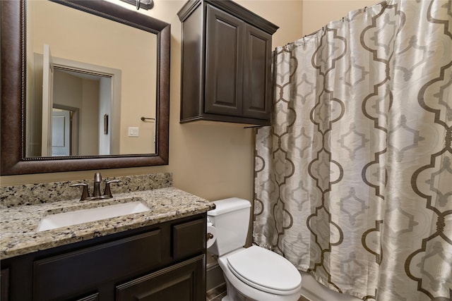 9010 Kapri Ln, Houston, TX 77025 - bathroom featuring vanity, toilet, and a shower with curtain