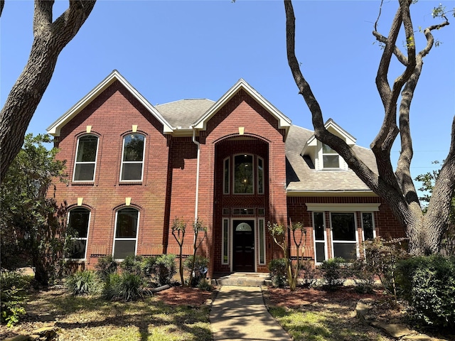 2810 Bright Trl, Sugar Land, TX 77479 - view of front facade featuring brick siding and a shingled roof