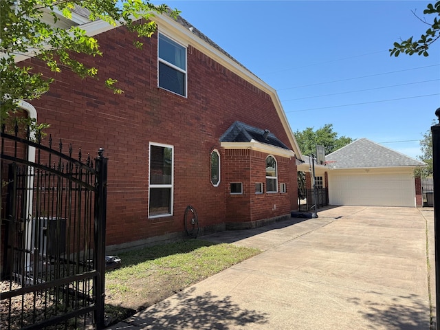 2810 Bright Trl, Sugar Land, TX 77479 - view of property exterior with brick siding, fence, driveway, and a gate