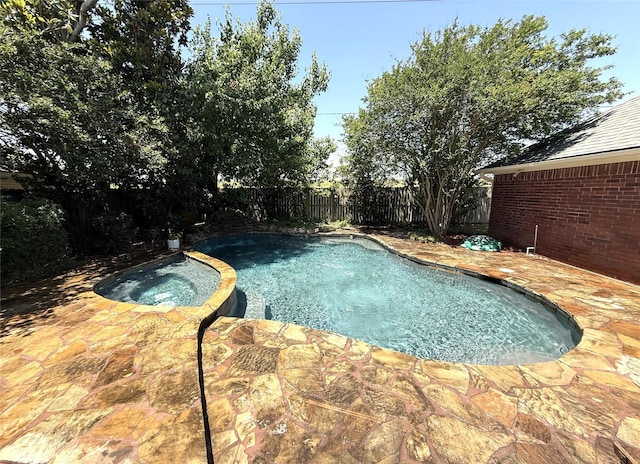 2810 Bright Trl, Sugar Land, TX 77479 - view of swimming pool featuring a fenced backyard, a patio area, and a pool with connected hot tub