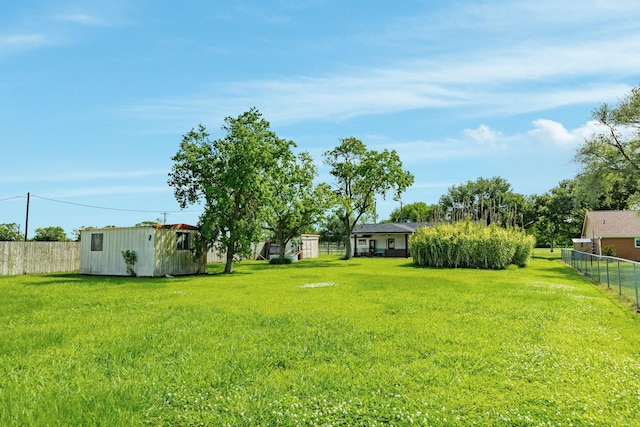 2735 County Road 208, Danbury, TX 77534 - view of yard featuring an outdoor structure and a shed