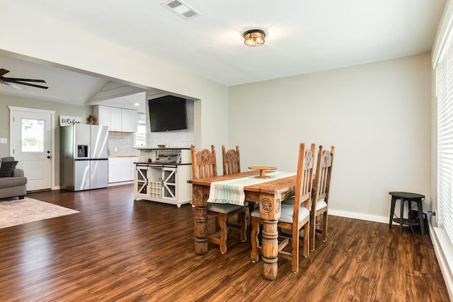 2735 County Road 208, Danbury, TX 77534 - dining space with dark wood-style floors, baseboards, and a ceiling fan