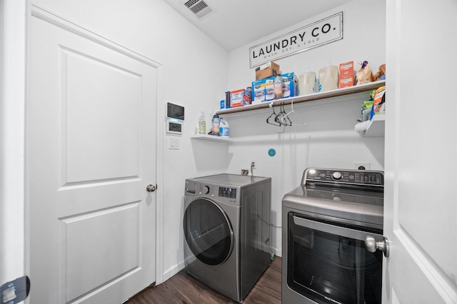 13215 Rowan Green Dr, Humble, TX 77346 - laundry area with independent washer and dryer and dark wood-style floors