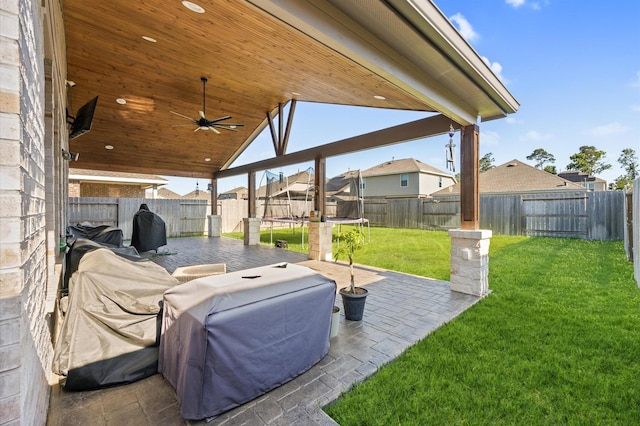 13215 Rowan Green Dr, Humble, TX 77346 - view of patio / terrace with a trampoline, ceiling fan, and a residential view