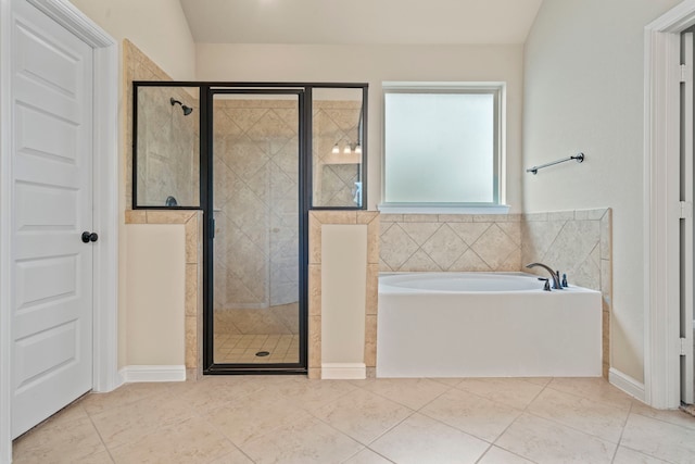 28010 Drifters Bend Dr, Spring, TX 77386 - bathroom featuring a bath, a stall shower, and tile patterned flooring