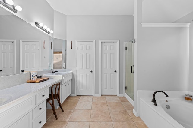 14123 Sherburn Manor Dr, Cypress, TX 77429 - full bath with double vanity, a stall shower, a bath, and tile patterned flooring
