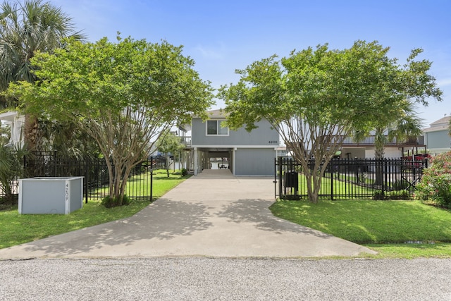 4209 W Bayside Way, Jamaica Beach, TX 77554 - view of front facade with a carport and driveway
