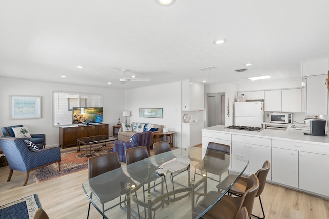 4209 W Bayside Way, Jamaica Beach, TX 77554 - dining area featuring light wood-type flooring, recessed lighting, and ceiling fan