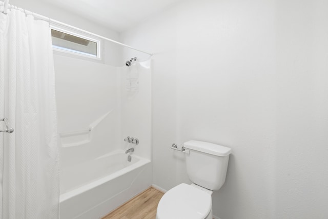 4209 W Bayside Way, Jamaica Beach, TX 77554 - full bathroom featuring wood finished floors, toilet, and shower / tub combo
