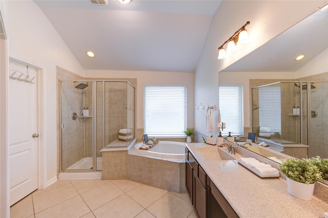 19503 Sundance Edge Ct, Richmond, TX 77407 - bathroom with lofted ceiling, tile patterned flooring, a stall shower, vanity, and a bath