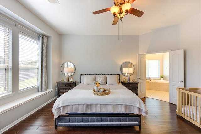 19503 Sundance Edge Ct, Richmond, TX 77407 - bedroom featuring hardwood / wood-style flooring, ensuite bathroom, and baseboards