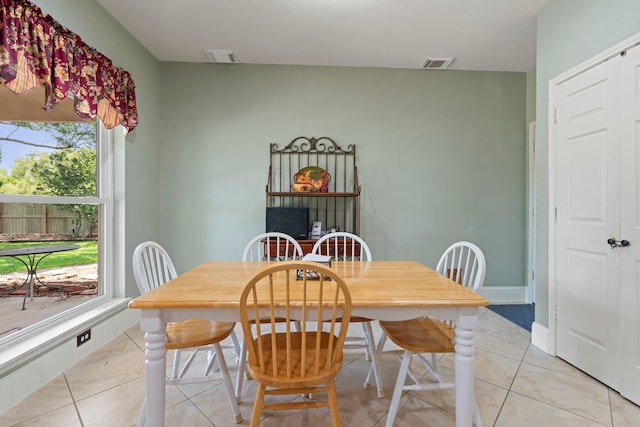 13506 Scenic Glade Dr, Houston, TX 77059 - dining room with light tile patterned floors