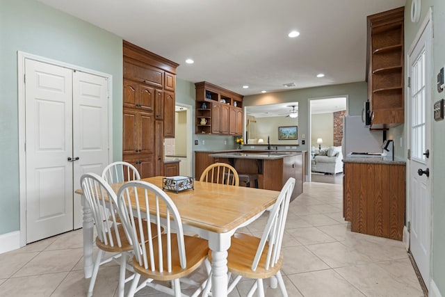 13506 Scenic Glade Dr, Houston, TX 77059 - dining room with light tile patterned floors and recessed lighting