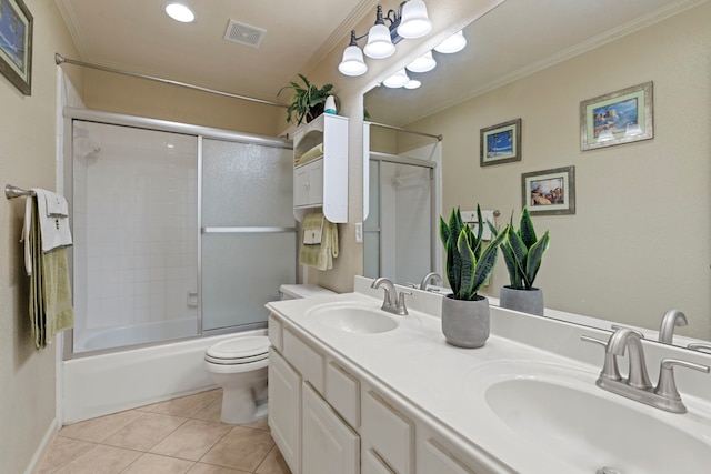 13506 Scenic Glade Dr, Houston, TX 77059 - full bath with crown molding, tile patterned floors, toilet, double vanity, and enclosed tub / shower combo