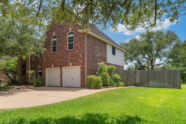 13506 Scenic Glade Dr, Houston, TX 77059 - view of home's exterior with brick siding, a garage, and driveway