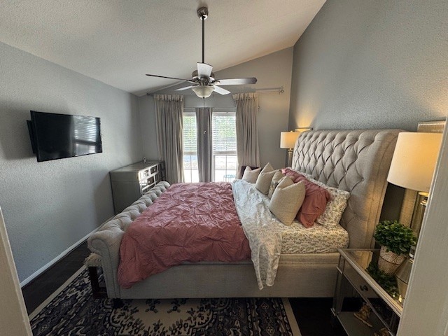 2211 S Kirkwood Rd Unit 1, Houston, TX 77077 - bedroom featuring lofted ceiling, baseboards, wood finished floors, and a ceiling fan