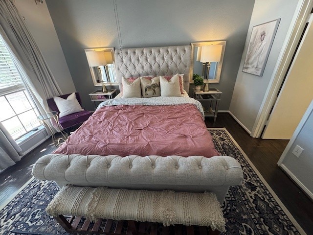 2211 S Kirkwood Rd Unit 1, Houston, TX 77077 - bedroom with wood finished floors and baseboards