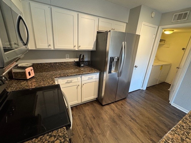 2211 S Kirkwood Rd Unit 1, Houston, TX 77077 - kitchen with stainless steel refrigerator with ice dispenser, washing machine and dryer, dark wood-type flooring, and white cabinetry