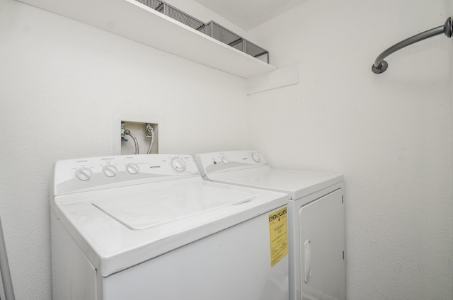 2211 S Kirkwood Rd Unit 1, Houston, TX 77077 - washroom featuring washing machine and dryer