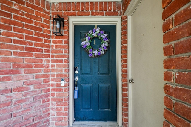 2211 S Kirkwood Rd Unit 1, Houston, TX 77077 - property entrance featuring brick siding