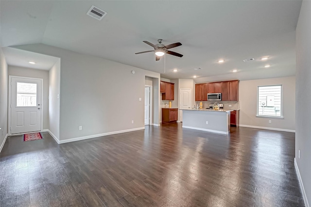 21622 Sage Landing Ln, Katy, TX 77449 - unfurnished living room featuring dark wood finished floors, ceiling fan, baseboards, and recessed lighting