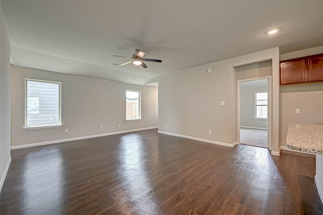 21622 Sage Landing Ln, Katy, TX 77449 - unfurnished living room with a ceiling fan, dark wood-type flooring, baseboards, and recessed lighting