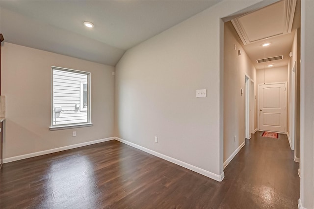 21622 Sage Landing Ln, Katy, TX 77449 - unfurnished room with attic access, dark wood finished floors, baseboards, and lofted ceiling