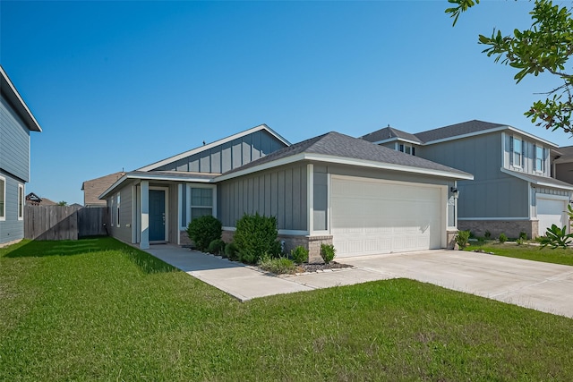 21622 Sage Landing Ln, Katy, TX 77449 - view of front facade featuring board and batten siding, an attached garage, concrete driveway, and brick siding
