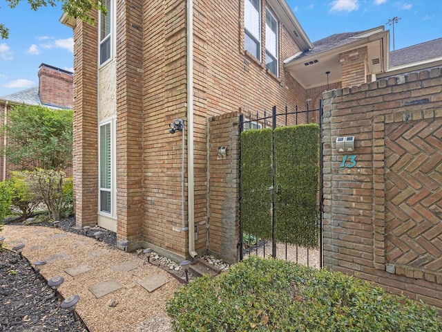 13 Hickory Shadows Dr, Houston, TX 77055 - view of home's exterior featuring brick siding