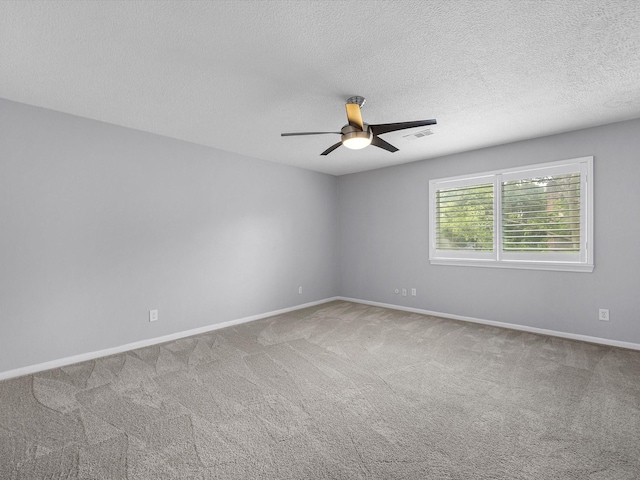 13 Hickory Shadows Dr, Houston, TX 77055 - empty room featuring ceiling fan, carpet flooring, baseboards, and a textured ceiling