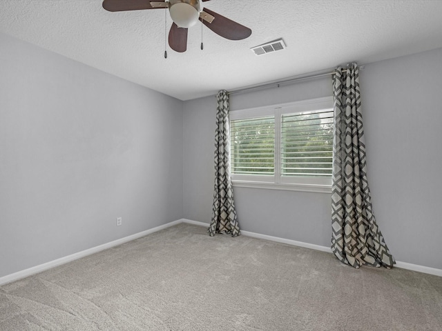 13 Hickory Shadows Dr, Houston, TX 77055 - spare room with a ceiling fan, carpet, a textured ceiling, and baseboards
