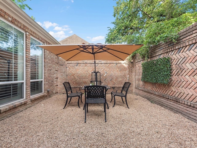 13 Hickory Shadows Dr, Houston, TX 77055 - view of patio / terrace featuring outdoor dining space