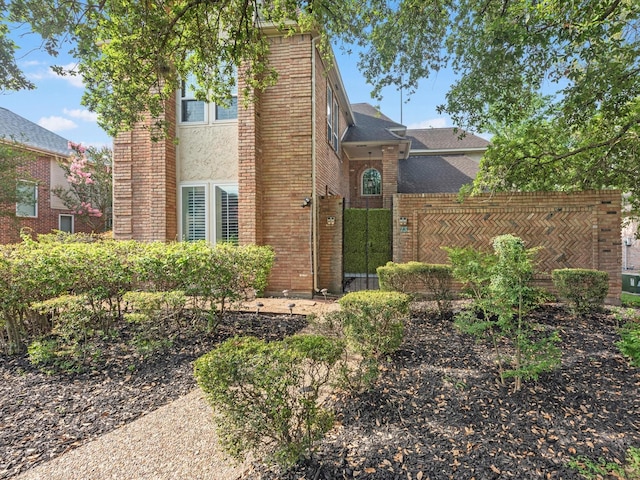 13 Hickory Shadows Dr, Houston, TX 77055 - view of front of property featuring brick siding