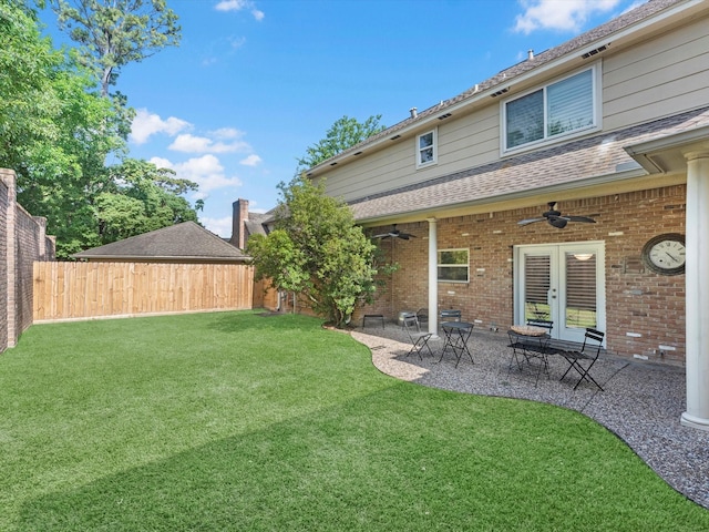 13 Hickory Shadows Dr, Houston, TX 77055 - view of yard featuring a ceiling fan, french doors, and a patio