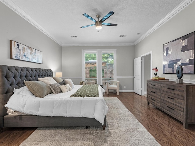 13 Hickory Shadows Dr, Houston, TX 77055 - bedroom with dark wood-type flooring, ornamental molding, a textured ceiling, a ceiling fan, and baseboards
