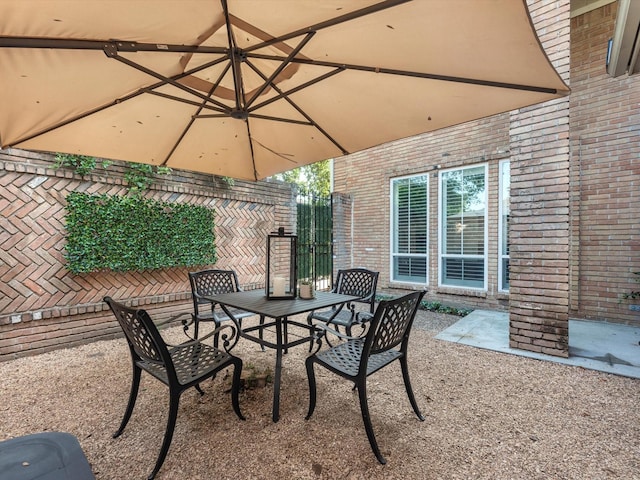 13 Hickory Shadows Dr, Houston, TX 77055 - view of patio with outdoor dining area