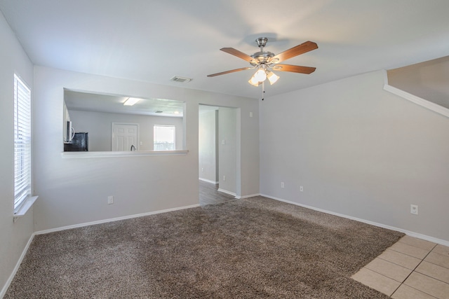 21002 Brannon Hill Ln, Humble, TX 77338 - unfurnished room with ceiling fan and baseboards