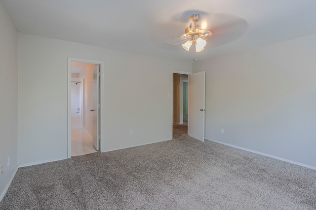 21002 Brannon Hill Ln, Humble, TX 77338 - unfurnished room featuring light colored carpet, ceiling fan, and baseboards