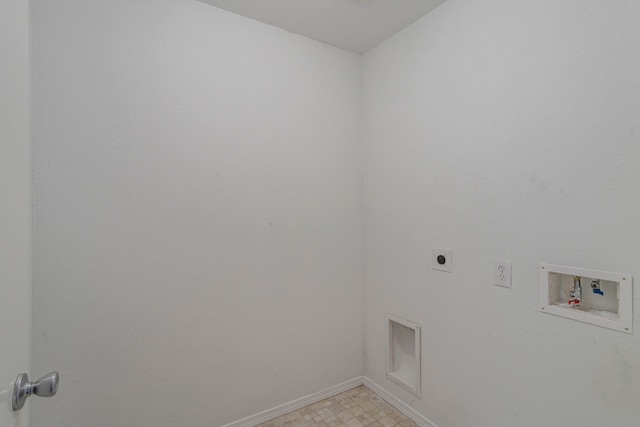 21002 Brannon Hill Ln, Humble, TX 77338 - laundry room with hookup for an electric dryer, hookup for a washing machine, baseboards, and light flooring