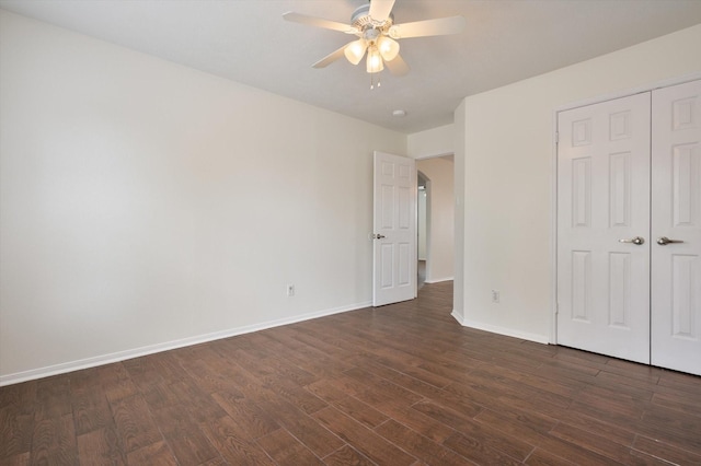 3118 Pheasant Trail Dr, Sugar Land, TX 77498 - unfurnished bedroom featuring dark wood-type flooring, baseboards, a closet, and ceiling fan